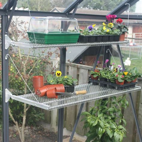 using metal racks in green house|greenhouse storage shelves.